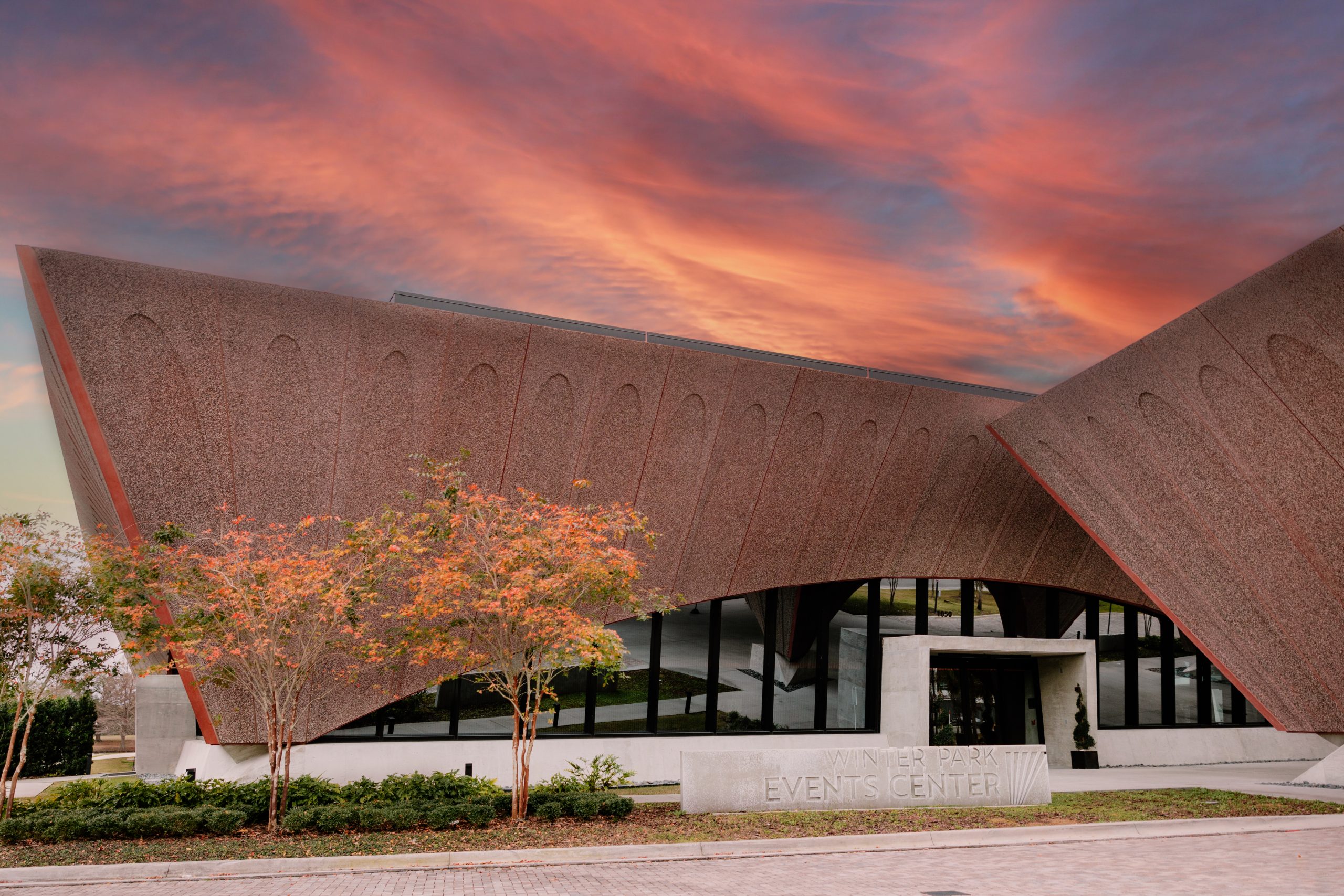 A sunset photo of Winter Park Event Center taken by Kindle & Grain